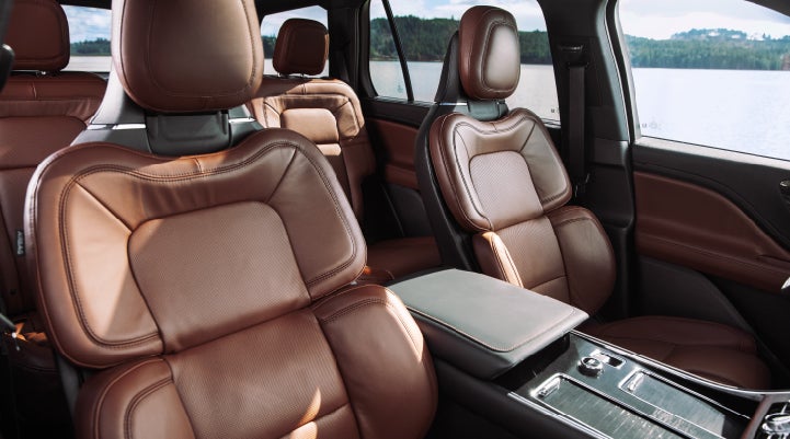 The front row's Perfect Position Seats in a 2024 Lincoln Aviator® Reserve model with Ebony Roast interior | Ed Morse Lincoln in Muscatine IA
